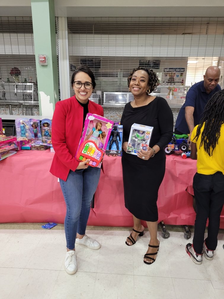 Mrs. Green with school board member Ms. Santos